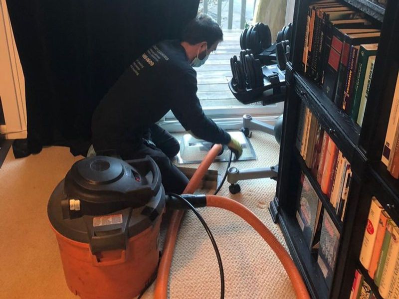 Clean ceiling air register after professional air duct cleaning