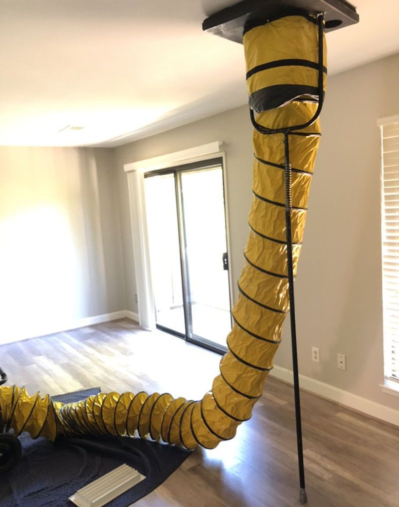 Cal Duct Cleaning technician performing air duct cleaning in a Bay Area home